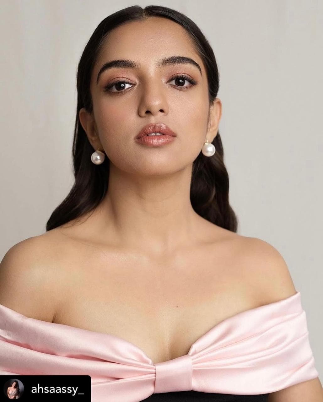 Soft rose-toned editorial portrait