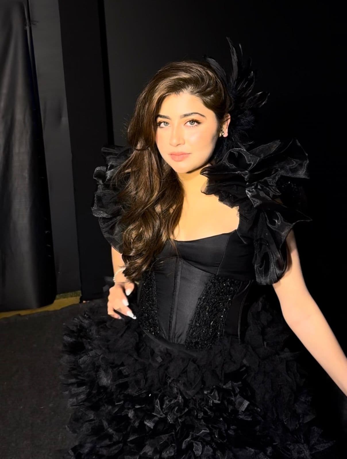 Dramatic black-gown evening glam